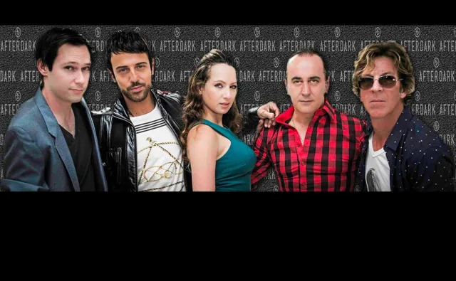 Afterdark band members photographed together in a professional studio portrait in Sydney.